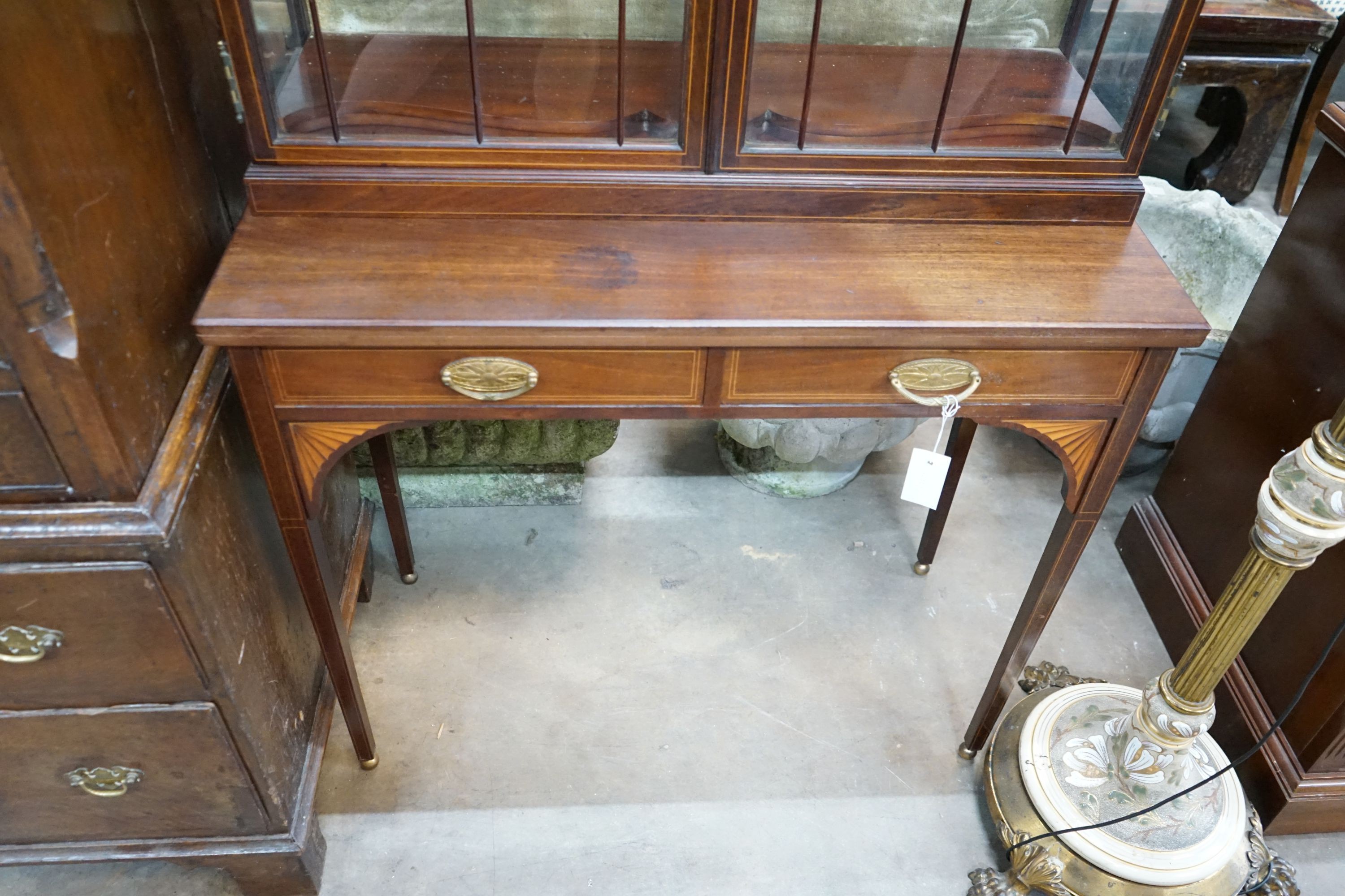 An Edwardian Sheraton revival inlaid mahogany display cabinet, width 86cm, depth 40cm, height 210cm